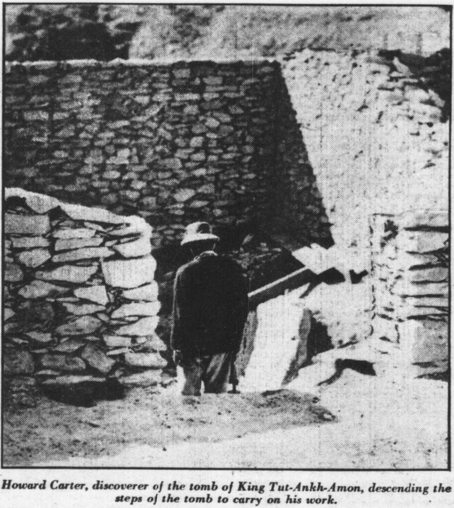 Howard Carter, discoverer of the tomb of King Tut-Ankh-Amon, descending the steps of the tomb to carry on his work.